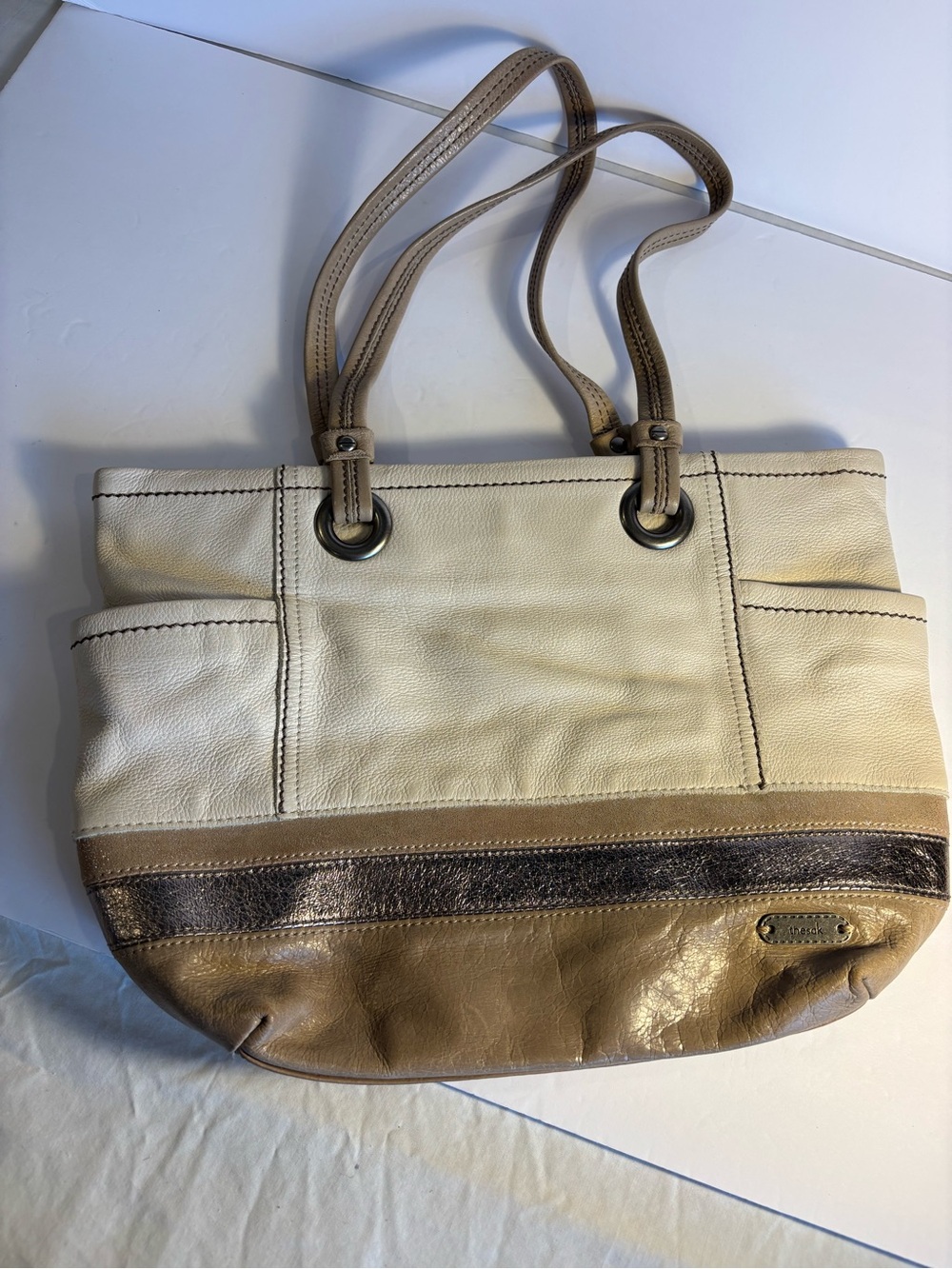 The Sak Leather Tote Bag in Cream and Tan with metallic leather bands